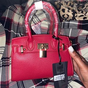 Red leather mini bag with shoulder strap included